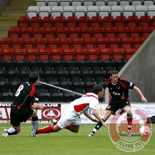 Gibson and McKay try to win the ball.