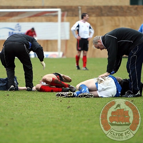 Brown and O'Connor receive treatment after a heavy knock.